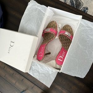 These are size 7 Dior heels thy have been used only a couple of times.Good shape